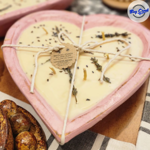 Large heart shaped beeswax candle.