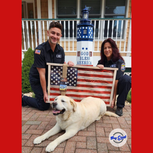 EMS-Team-With-Dog-And-Flag